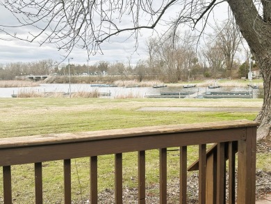 Enjoy the beauty of Pistakee Lake from this charming 1-bedroom on Pistakee Country Club in Illinois - for sale on GolfHomes.com, golf home, golf lot