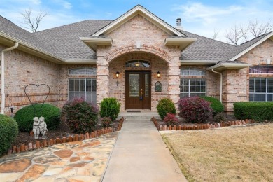 Welcome to this stunning 3-bedroom, 2-bathroom home in the heart on Pecan Plantation Country Club in Texas - for sale on GolfHomes.com, golf home, golf lot