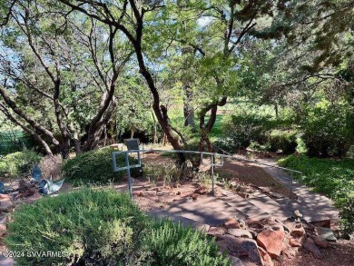 Open your private gated bridge to enter this beautiful oasis on Oakcreek Country Club in Arizona - for sale on GolfHomes.com, golf home, golf lot