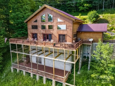 Come and see this beautiful home located in Wolf Laurel perched on Wolf Laurel Country Club in North Carolina - for sale on GolfHomes.com, golf home, golf lot