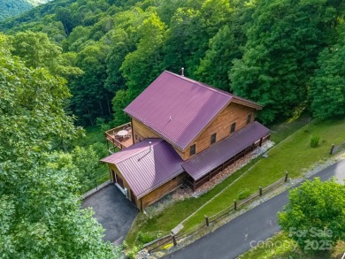 Come and see this beautiful home located in Wolf Laurel perched on Wolf Laurel Country Club in North Carolina - for sale on GolfHomes.com, golf home, golf lot