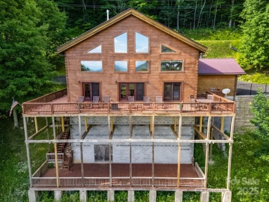 Come and see this beautiful home located in Wolf Laurel perched on Wolf Laurel Country Club in North Carolina - for sale on GolfHomes.com, golf home, golf lot