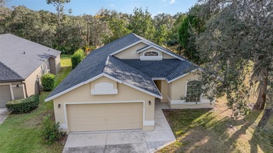 Welcome to the perfect Florida retreat where lush green fairways on Oakwood Golf Club in Florida - for sale on GolfHomes.com, golf home, golf lot