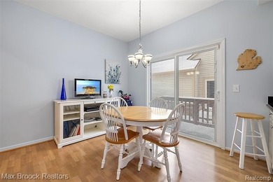 Welcome home to this charming detached colonial-style condo in on The Maples Club in Michigan - for sale on GolfHomes.com, golf home, golf lot