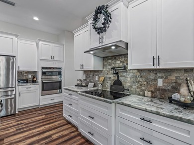 Stunning 5,100 sq ft home with located right across from the on Wildwood Country Club in Florida - for sale on GolfHomes.com, golf home, golf lot