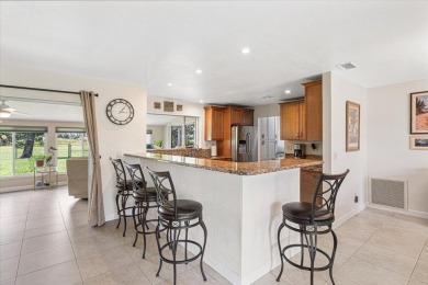 Tucked along a quiet stretch of Sandpiper Bay, this home blends on Club Med Sandpiper in Florida - for sale on GolfHomes.com, golf home, golf lot
