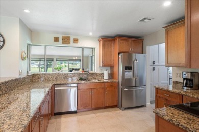Tucked along a quiet stretch of Sandpiper Bay, this home blends on Club Med Sandpiper in Florida - for sale on GolfHomes.com, golf home, golf lot
