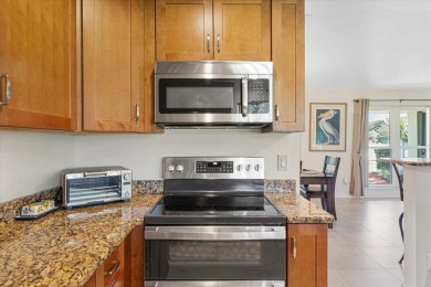 Tucked along a quiet stretch of Sandpiper Bay, this home blends on Club Med Sandpiper in Florida - for sale on GolfHomes.com, golf home, golf lot