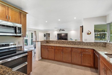 Tucked along a quiet stretch of Sandpiper Bay, this home blends on Club Med Sandpiper in Florida - for sale on GolfHomes.com, golf home, golf lot