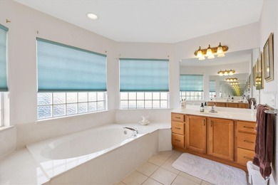 Tucked inside the sought-after 55+ Gated Golf Community of on Stonecrest Golf and Club Club in Florida - for sale on GolfHomes.com, golf home, golf lot