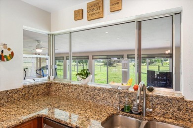 Tucked along a quiet stretch of Sandpiper Bay, this home blends on Club Med Sandpiper in Florida - for sale on GolfHomes.com, golf home, golf lot