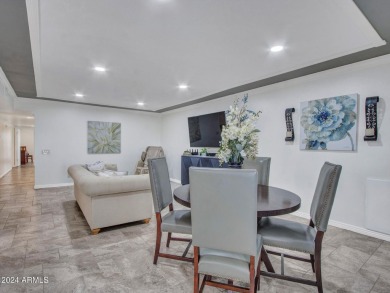 This beautifully remodeled home has been thoughtfully upgraded on PalmBrook Country Club in Arizona - for sale on GolfHomes.com, golf home, golf lot