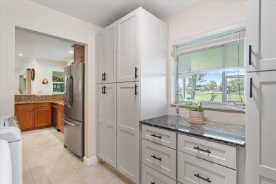 Tucked along a quiet stretch of Sandpiper Bay, this home blends on Club Med Sandpiper in Florida - for sale on GolfHomes.com, golf home, golf lot