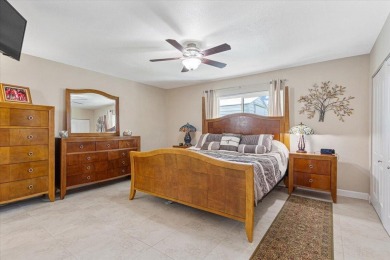 Tucked along a quiet stretch of Sandpiper Bay, this home blends on Club Med Sandpiper in Florida - for sale on GolfHomes.com, golf home, golf lot