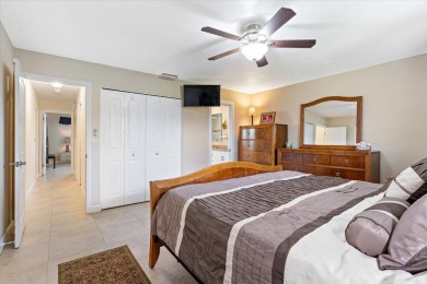 Tucked along a quiet stretch of Sandpiper Bay, this home blends on Club Med Sandpiper in Florida - for sale on GolfHomes.com, golf home, golf lot