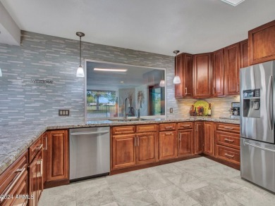 This beautifully remodeled home has been thoughtfully upgraded on PalmBrook Country Club in Arizona - for sale on GolfHomes.com, golf home, golf lot