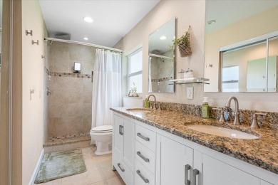 Tucked along a quiet stretch of Sandpiper Bay, this home blends on Club Med Sandpiper in Florida - for sale on GolfHomes.com, golf home, golf lot