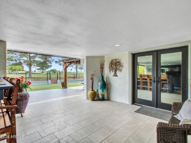 This beautifully remodeled home has been thoughtfully upgraded on PalmBrook Country Club in Arizona - for sale on GolfHomes.com, golf home, golf lot