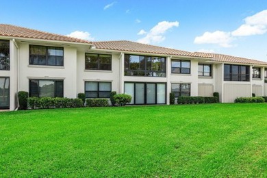 Picturesque double fairway views from this stunning 2nd floor, 3 on Quail Ridge Golf Course and Country Club in Florida - for sale on GolfHomes.com, golf home, golf lot