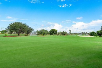 Picturesque double fairway views from this stunning 2nd floor, 3 on Quail Ridge Golf Course and Country Club in Florida - for sale on GolfHomes.com, golf home, golf lot