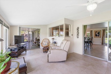 Tucked along a quiet stretch of Sandpiper Bay, this home blends on Club Med Sandpiper in Florida - for sale on GolfHomes.com, golf home, golf lot