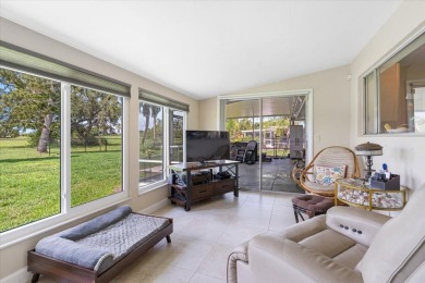 Tucked along a quiet stretch of Sandpiper Bay, this home blends on Club Med Sandpiper in Florida - for sale on GolfHomes.com, golf home, golf lot