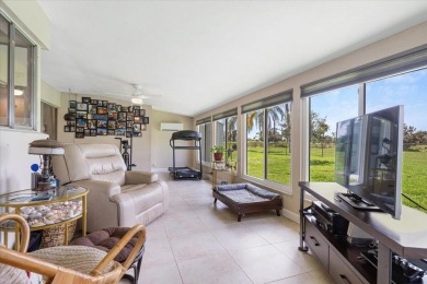 Tucked along a quiet stretch of Sandpiper Bay, this home blends on Club Med Sandpiper in Florida - for sale on GolfHomes.com, golf home, golf lot