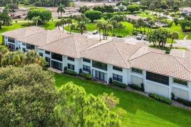 Picturesque double fairway views from this stunning 2nd floor, 3 on Quail Ridge Golf Course and Country Club in Florida - for sale on GolfHomes.com, golf home, golf lot