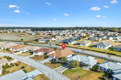 Tucked inside the sought-after 55+ Gated Golf Community of on Stonecrest Golf and Club Club in Florida - for sale on GolfHomes.com, golf home, golf lot