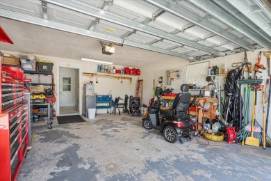 Tucked along a quiet stretch of Sandpiper Bay, this home blends on Club Med Sandpiper in Florida - for sale on GolfHomes.com, golf home, golf lot