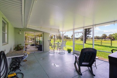 Tucked along a quiet stretch of Sandpiper Bay, this home blends on Club Med Sandpiper in Florida - for sale on GolfHomes.com, golf home, golf lot
