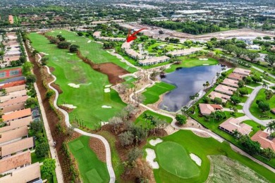 Picturesque double fairway views from this stunning 2nd floor, 3 on Quail Ridge Golf Course and Country Club in Florida - for sale on GolfHomes.com, golf home, golf lot