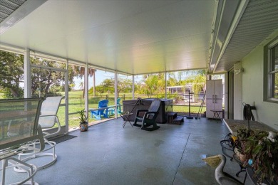 Tucked along a quiet stretch of Sandpiper Bay, this home blends on Club Med Sandpiper in Florida - for sale on GolfHomes.com, golf home, golf lot