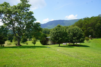 Nestled at the base of majestic English Mountain on Smoky Mountain Country Club in Tennessee - for sale on GolfHomes.com, golf home, golf lot