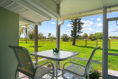 Tucked along a quiet stretch of Sandpiper Bay, this home blends on Club Med Sandpiper in Florida - for sale on GolfHomes.com, golf home, golf lot