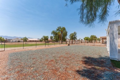 Welcome to this well-maintained 3 bedroom, 2 bathroom home on Desert Lakes Golf Course in Arizona - for sale on GolfHomes.com, golf home, golf lot