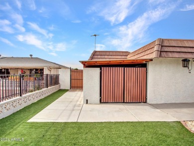 This beautifully remodeled home has been thoughtfully upgraded on PalmBrook Country Club in Arizona - for sale on GolfHomes.com, golf home, golf lot