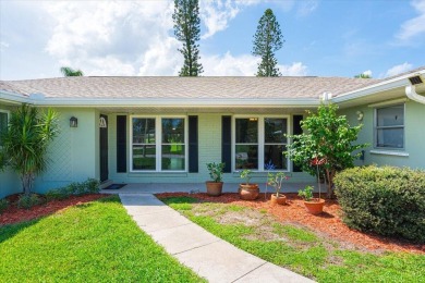 Tucked along a quiet stretch of Sandpiper Bay, this home blends on Club Med Sandpiper in Florida - for sale on GolfHomes.com, golf home, golf lot