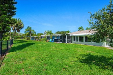 Tucked along a quiet stretch of Sandpiper Bay, this home blends on Club Med Sandpiper in Florida - for sale on GolfHomes.com, golf home, golf lot