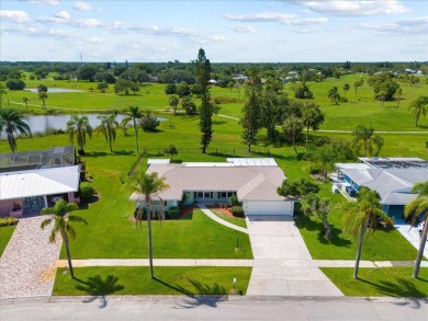 Tucked along a quiet stretch of Sandpiper Bay, this home blends on Club Med Sandpiper in Florida - for sale on GolfHomes.com, golf home, golf lot
