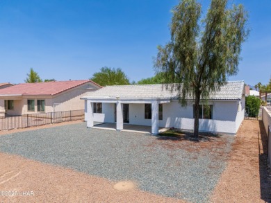 Welcome to this well-maintained 3 bedroom, 2 bathroom home on Desert Lakes Golf Course in Arizona - for sale on GolfHomes.com, golf home, golf lot