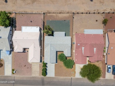 Welcome to this well-maintained 3 bedroom, 2 bathroom home on Desert Lakes Golf Course in Arizona - for sale on GolfHomes.com, golf home, golf lot