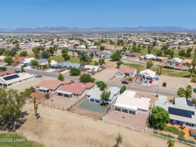 Welcome to this well-maintained 3 bedroom, 2 bathroom home on Desert Lakes Golf Course in Arizona - for sale on GolfHomes.com, golf home, golf lot