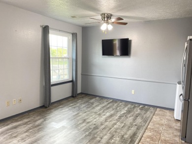 This remodeled, WALK-IN, 2 bed 2 bath, GOLF VIEW end unit is on Pointe Royale Village Country Club in Missouri - for sale on GolfHomes.com, golf home, golf lot