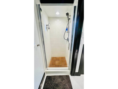 This beautifully updated and modern Executive Suite sits on an on The Great Outdoors Golf and Country Club in Florida - for sale on GolfHomes.com, golf home, golf lot