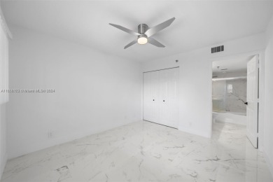 Discover this beautifully renovated 2-bedroom, 2-bathroom condo on Marina Lakes Golf Course in Florida - for sale on GolfHomes.com, golf home, golf lot