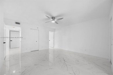 Discover this beautifully renovated 2-bedroom, 2-bathroom condo on Marina Lakes Golf Course in Florida - for sale on GolfHomes.com, golf home, golf lot