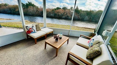 This beautifully updated and modern Executive Suite sits on an on The Great Outdoors Golf and Country Club in Florida - for sale on GolfHomes.com, golf home, golf lot