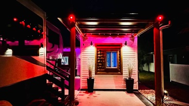 This beautifully updated and modern Executive Suite sits on an on The Great Outdoors Golf and Country Club in Florida - for sale on GolfHomes.com, golf home, golf lot