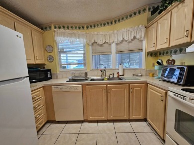 This home is located on leased land in a 55+ resort-style MH on Big Cypress Golf and Country Club in Florida - for sale on GolfHomes.com, golf home, golf lot
